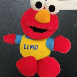 Elmo Toss And Tickle Me Plush 1997
Elmo Toss And Tickle Me Plush 1997 Tyco Talking Laughing Wiggles Stuffed Animal.
