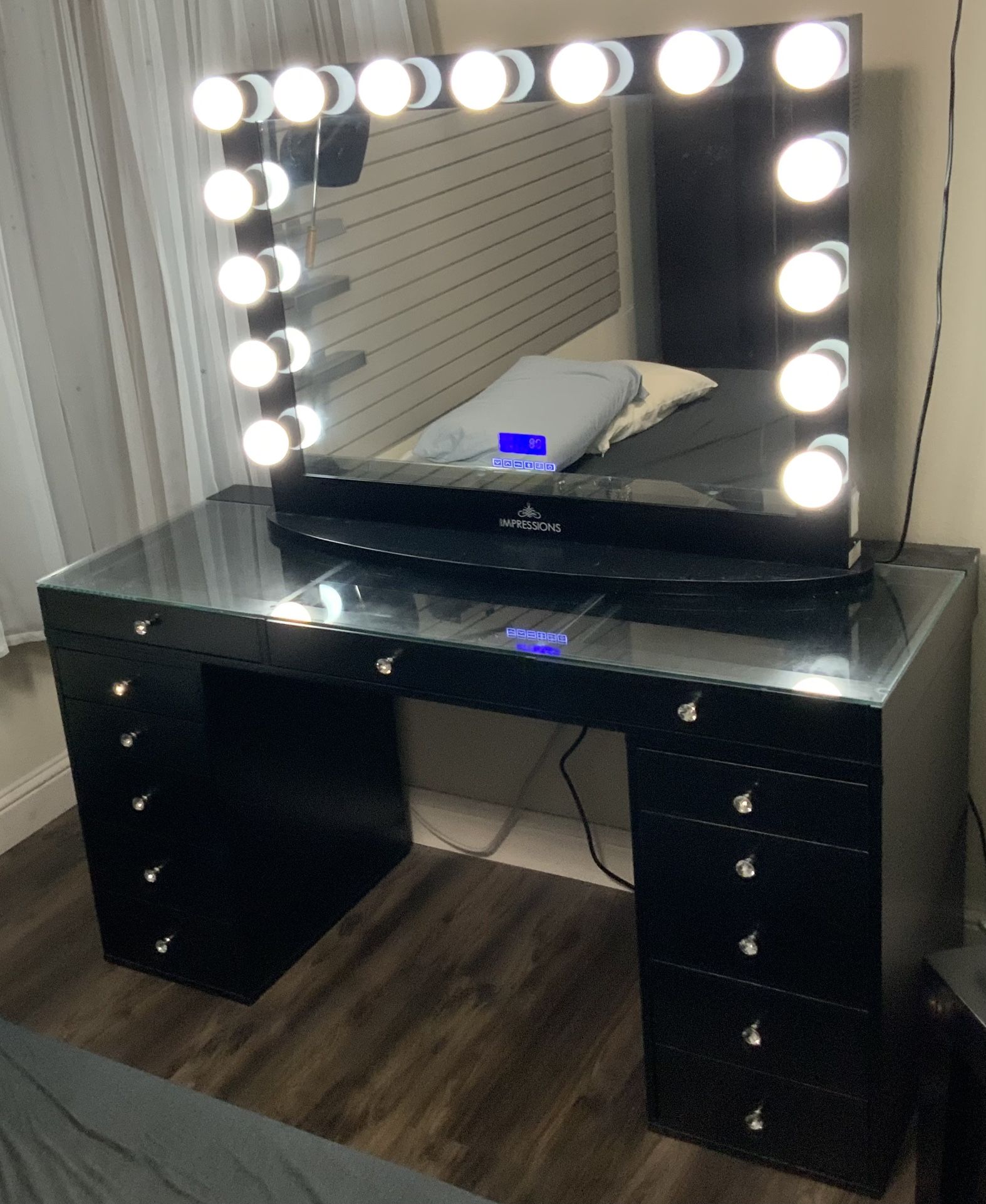 Vanity with electronic mirror and storage