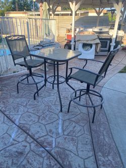 Patio Table Set With Two Swivel Chairs