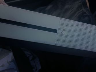Xbox one s comes with power cords/charger/battery pack/controller with broken left joystick