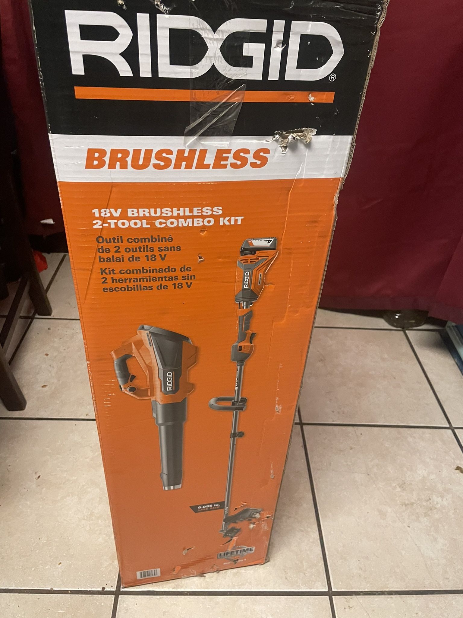 RIDGID 18V Brushless 14 in. Cordless Battery String Trimmer and Leaf Blower 2-Tool Combo Kit with 4.0 Ah Battery and Charger