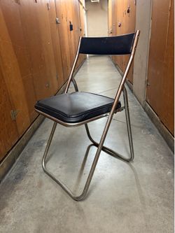 chrome folding chair by Fujiset