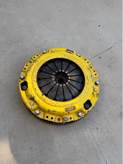 6 bolt 4G63 OEM flywheel with ACT clutch and pressure plate.