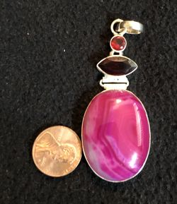 Pink stone pendant set in silver
