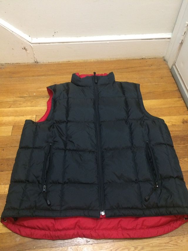 Red And Black 2 Sided Comfy And Heavy Duty Winter Vest. Message me anytime if intertested or want more pictures or videos of it thank you.