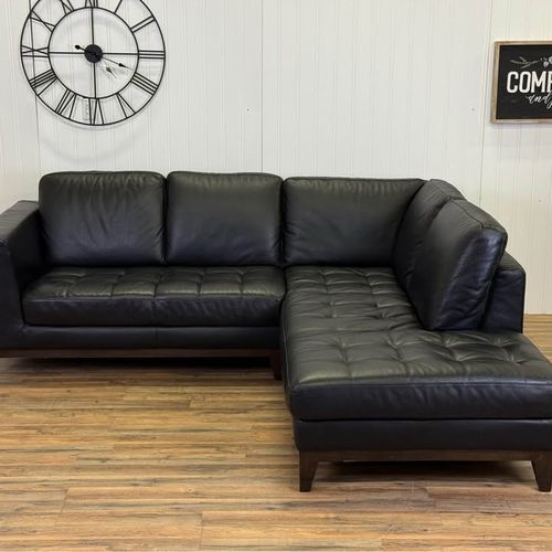 Natuzzi leather sectional couch delivery available