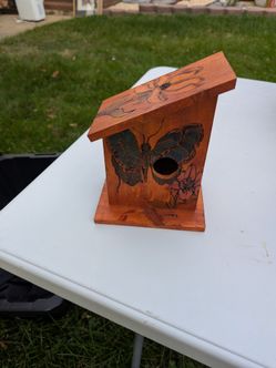 Birdhouse wood-burning art