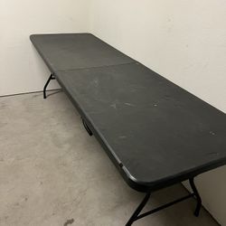 Black folding table 8-foot (width 30”)