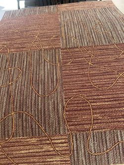 Used carpet tiles w/ pad.