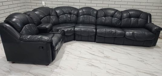 4 piece black real leather sectional with recliners and Convertible bed
