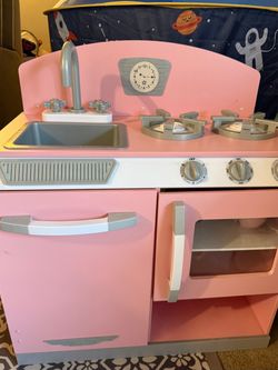 Pink play kitchen