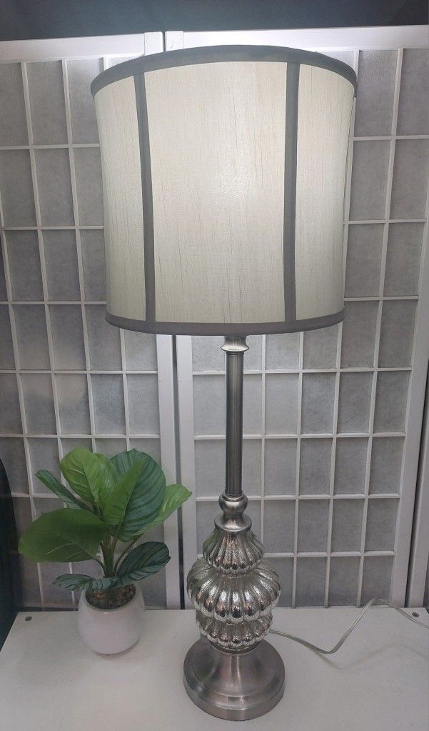 Large Table Lamp with a nickel finish.