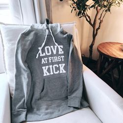 "Love At First Kick" Motherhood Maternity Hoodie 