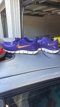 Nike purple size 8 womens, brown size 8.5