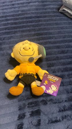 This is the official Snoopy in Space: Charlie Brown (Mission Control) plush doll.