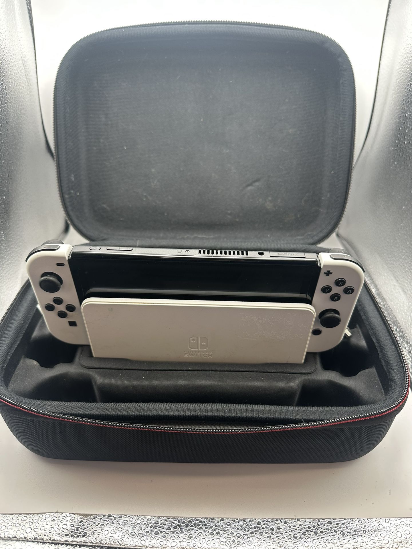 Nintendo Switch OLED w/ White Joycons