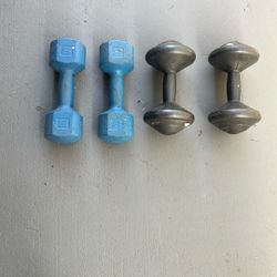 Two Sets Of Dumbbells