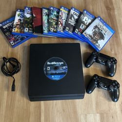 PS4, 2 Controllers, 12 Games & Charging Doc