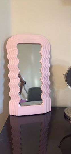 Pink swirly mirror