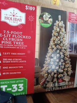 7.5-foot pre-lit flocked clyburn pine tree