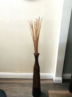Vase with reeds