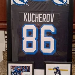 NIKITA KUCHEROV OF THE TAMPA BAY LIGHTING, FRAMED JERSEY.