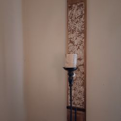 Set of wall sconces 28 inches in length.