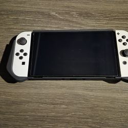 OLED Nintendo SWITCH/ 2 GAMES