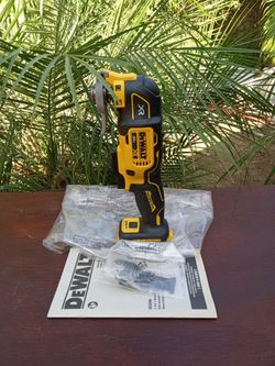 DeWalt 20 v. New XR. Multi tool.  3 speed.   W / blade