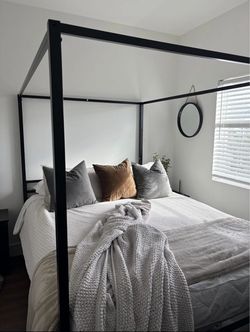 Queen black canopy bed frame