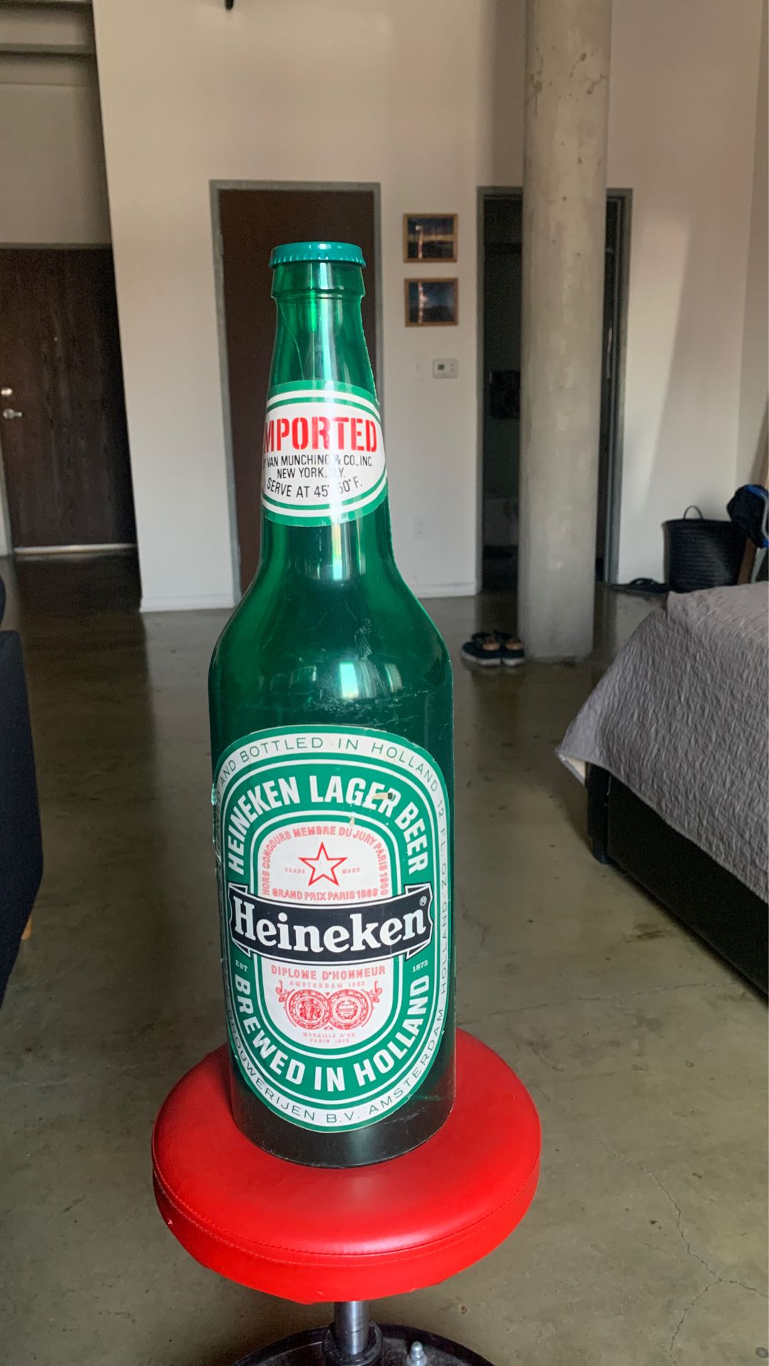 Giant oversized antique Heineken bottle plastic