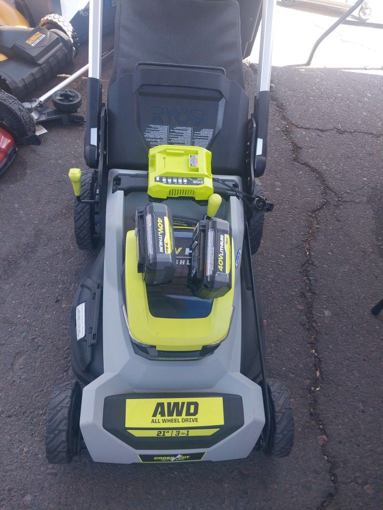 RYOBI LAWN MOWER X2 40V LITHIUM BRUSHLESS WITH 2 BATTERYS AND CHARGER SELF DRIVE 