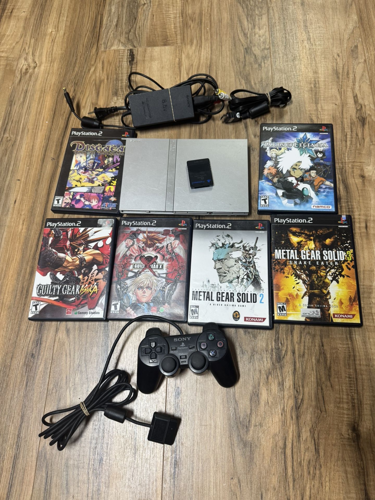 Silver Sony PS2 Slim W/ Complete In Box Games + Hookups!