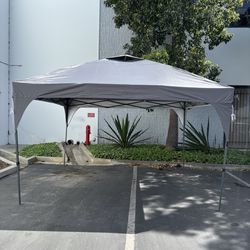 12x12 Pop Up Canopy Tent with One Push Setup, with 4 PVC Transparent Sidewalls - available in white red khaki and blue