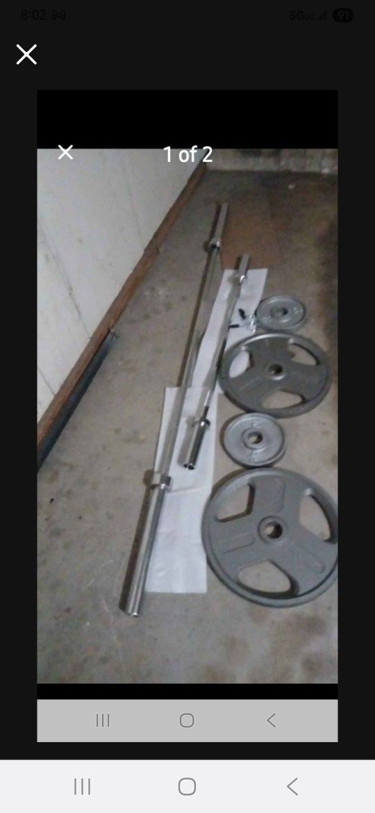 Curl Bar And Curl Bar And  Weights . . 