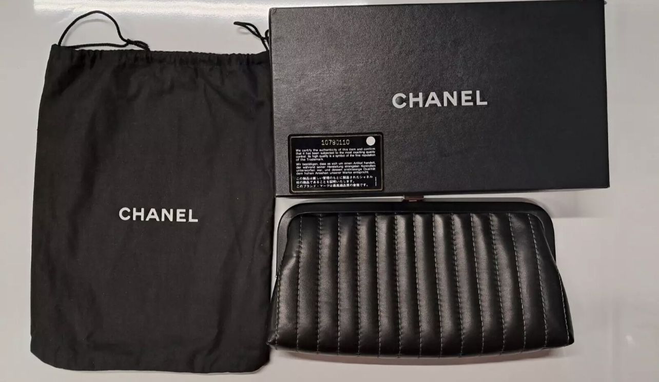 Chanel Mademoiselle Clutch Vertical Quilted Lambskin Black