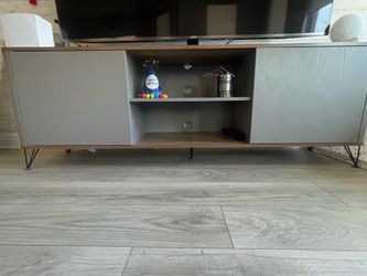 Stylish mid-century modern TV stand, perfect for your living room.