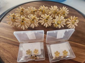 USED 11 napking rings and 2 new  pair of earings