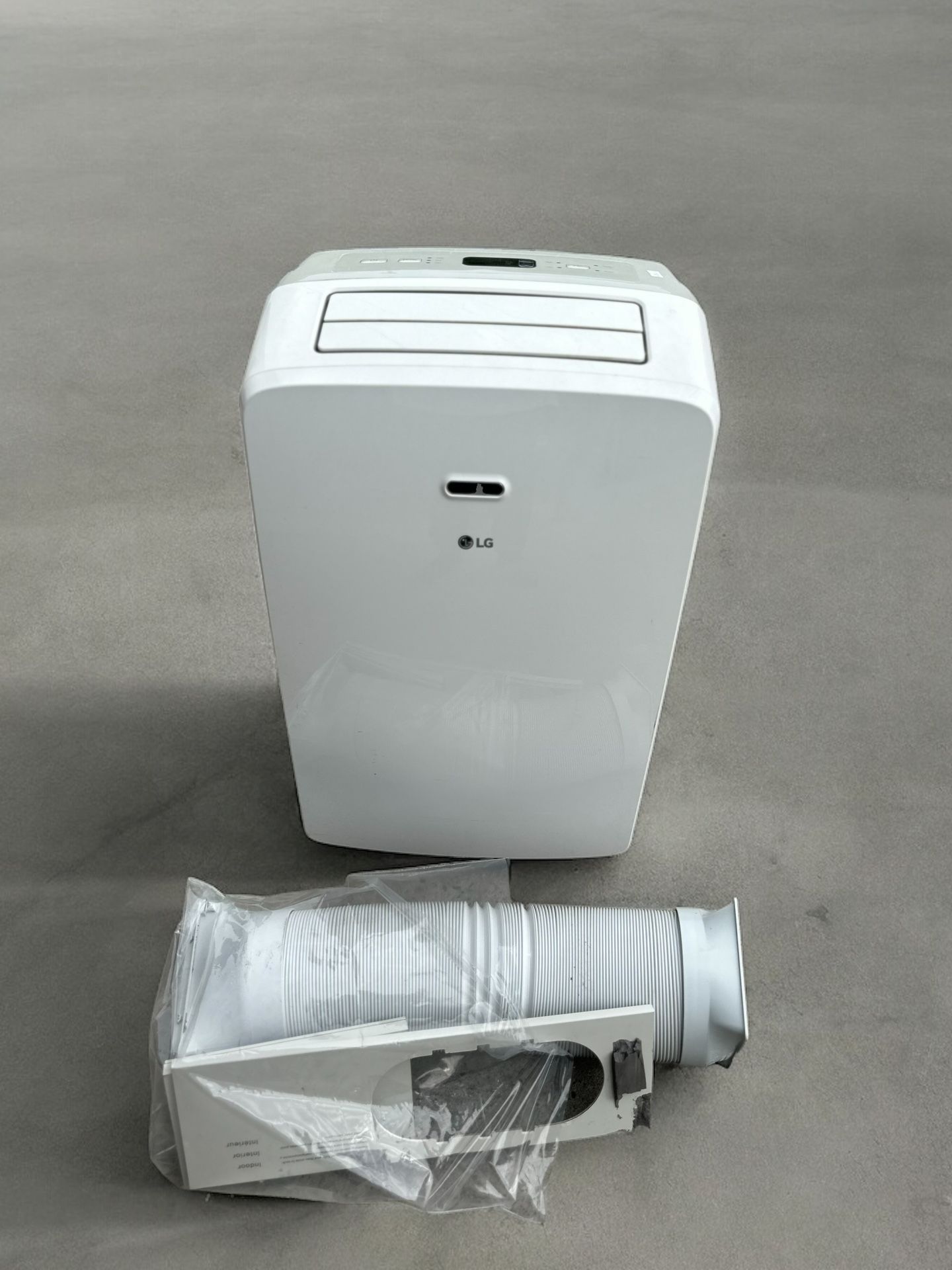 LG 10,200 BTU Portable Air Conditioner - Model LP1017WSR - includes hose and window attachment