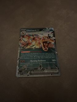 Pokemon Card Charizard ex from the Obsidian Flames set featuring the Burning Darkness attack and Infernal Reign