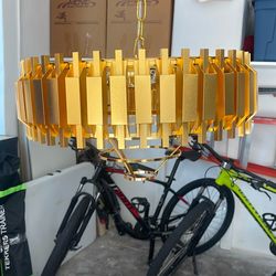 Gold colored metal light fixture-5 lights