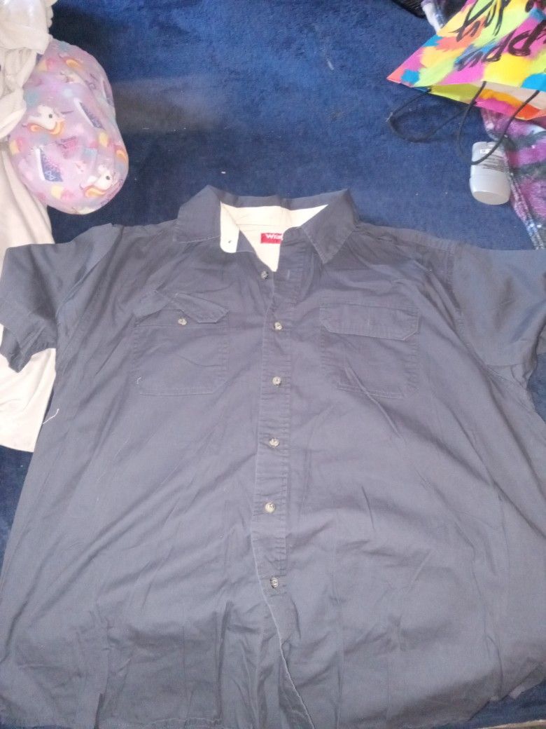 Navy blue wrangler short sleeve actually Large work shirt.