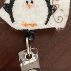 Penguin Badge Reel