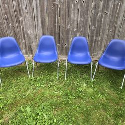 4 Blue Naugahyde and fiberglass Stackable Eames Chairs For Herman Miller 