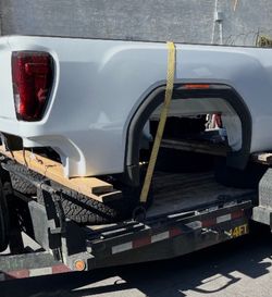 2026 GMC Sierra three-quarter ton parts. Tailgate, tail, lights, bed, and bumper.