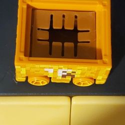 The Hot Wheels Minecraft Minecart Kids Model Diecast Toy Car is a 1:64 scale vehicle from the Hot Wheels Screen Time series. 