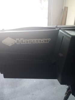 Harmed powered boom lift