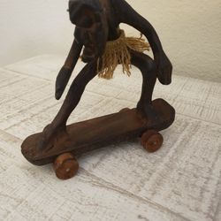 Wood Hand Carved African Man Skater