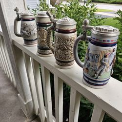 Four  Vintage Beer Steins
