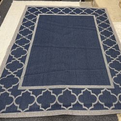 New Outdoor Rug-Brand new 8x10 indoor/outdoor area rug in a classic Moroccan trellis pattern.